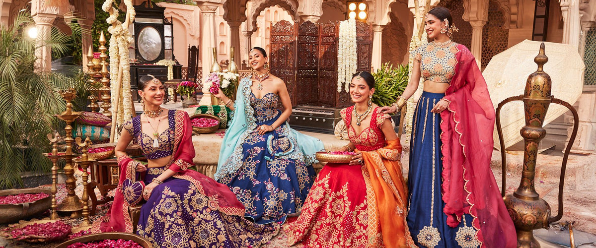 Creole ZIVARA inner banner showcasing handcrafted raw silk bridal lehengas and royal suit sets